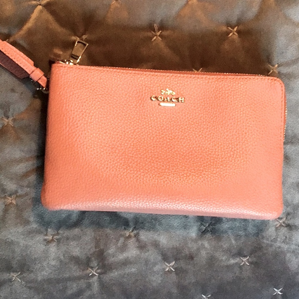 Coach wristlet handbag. Beautiful soft rose color.